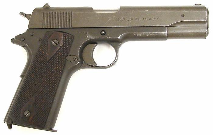 38969097_Colt_M1911_Gun_is_parkerized_for_WWII__2.jpg