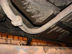 Колено между глушителем и резонатором