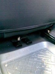 За водителем