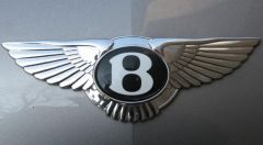 А эмблема Ланоса мне все же болшьше по душе, роднее...